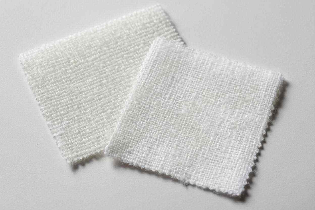 Perbedaan tekstur kain microtex dan katun asli sebagai bahan pakaian